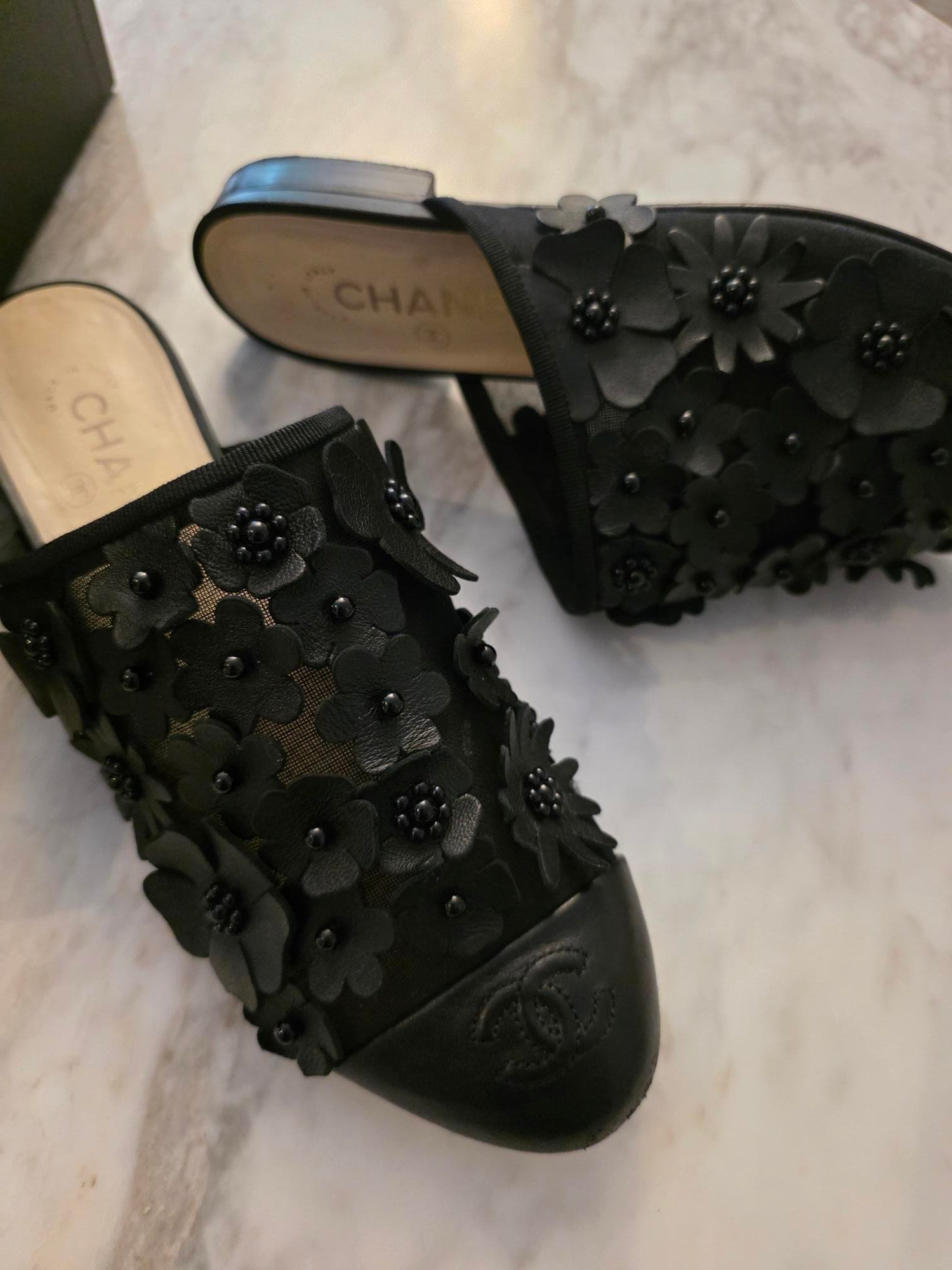 Mules Chanel camélia